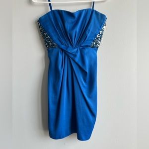 Strapless dress with decorations on the sides, size 2